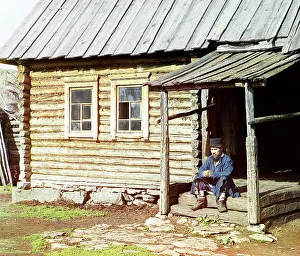 Porch Prints: Bashkir near his house, Ekhia, 1910. Creator: Sergey Mikhaylovich Prokudin-Gorsky