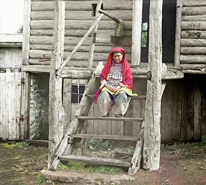 House On Stilts Prints: Bashkir woman in a folk costume, 1910. Creator: Sergey Mikhaylovich Prokudin-Gorsky