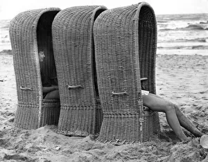 Basket shelters on a beach in Belgium, 1966