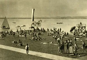Sunbathing Prints: Bathers on the shores of Lake Constance, Bregenz, Austria, c1935. Creator: Unknown