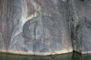 Buddhist Prints: Bathing elephant carved in low relief in a Buddhist shrine