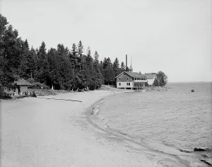 Boathouse Prints: Beach and boat house, Hotel Champlain, N.Y. between 1900 and 1910. Creator: Unknown