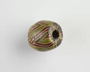 Jewelry And Ornament Gallery: Bead. One end chipped, Roman Period, 1st-2nd century. Creator: Unknown