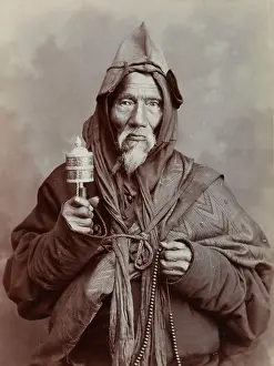 South Asian Prints: A bearded elderly man, carrying a prayer wheel and a rosary