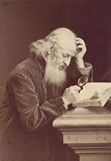 Adam Salomon Antoine Samuel Collection: [Bearded Man with Magnifying Glass Examining a Manuscript], 1870s