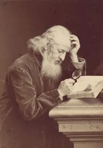 [Bearded Man with Magnifying Glass Examining a Manuscript], 1870s