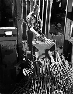Beating Gallery: Beating hot garden forks, Ward & Payne Ltd, Sheffield, South Yorkshire, 1965