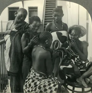 Zanzibar Tanzania Prints: A Beauty Parlor on Zanzibar, Africa - Swahili women take care of their hair, c1930s
