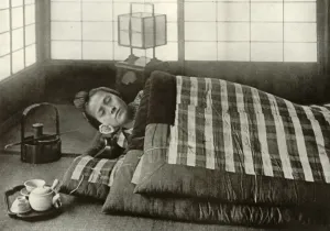 In Lotus Land Japan Prints: Bed-Time in Japan, 1910. Creator: Herbert Ponting