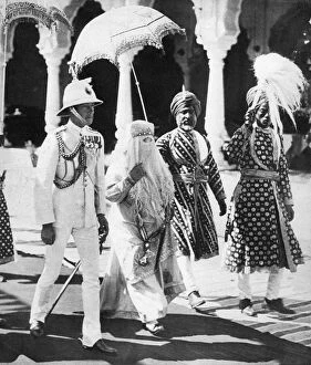 House Of Windsor Collection: The Begum of Bhopal escorts the Prince of Wales to the Durbar Hall, India, 1921
