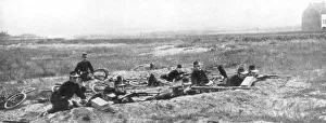 Belgian bicycle troops using Hotchkiss machine guns in Haelen, Belgium, August 1914. Artist: Montigny