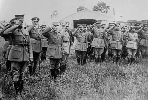 Headquarters Prints: Belgians salute U.S. flag, 4 July 1918. Creator: Bain News Service