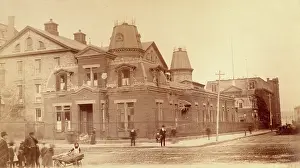 Street Vendor Prints: Bellevue Hospital, New York City: a street corner with hospital buildings and people