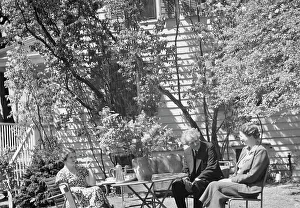 Social Life Prints: Benson, Mary, Mrs. with Arnold Genthe and an unidentified woman seated ouside