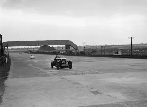 Straight Prints: Bentley and Frazer-Nash BMW racing at Brooklands, 1938 or 1939. Artist: Bill Brunell