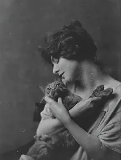 Adoring Prints: Bermicchi, Miss, with Buzzer the cat, portrait photograph, 1916. Creator: Arnold Genthe