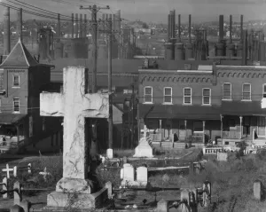 Rowhouse Prints: Bethlehem graveyard and steel mill, Pennsylvania, 1935. Creator: Walker Evans
