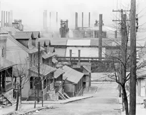 Chimneys Prints: Bethlehem houses and steel mill, Pennsylvania, 1935. Creator: Walker Evans