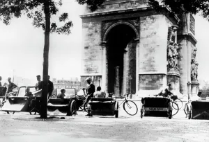 Adaptation Gallery: Bicycle taxis in the Place d Etoile by the Arc de Triomphe, German-occupied Paris, August 1943