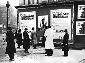Billboard Collection: Billboard dispaying Rassemblement Nationale Populaire posters, German-occupied Paris, February 1941