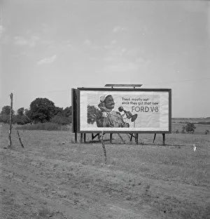 Hoarding Prints: Billboard sign, Southern California, near Los Angeles, 1936. Creator: Dorothea Lange