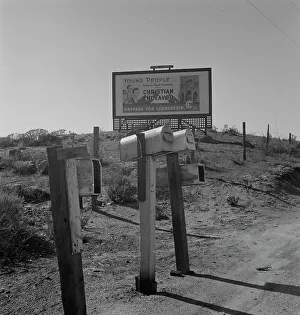 Hoarding Prints: Billboard on U.S. Highway 99, California, 1937. Creator: Dorothea Lange