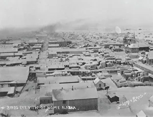 Lomen Brothers Company Prints: Bird's eye view of Nome with snow, between c1900 and c1930. Creator: Lomen Brothers