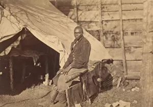 Us Army Gallery: [Black Soldier in Camp], ca. 1863. Creator: Alexander Gardner