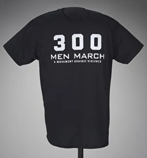 Cotton Prints: Black t-shirt for 300 Men March worn at a rally after the death of Freddie Gray, 2015