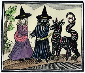 Discovery of Witches Gallery: A black and a white witch with a devil animal