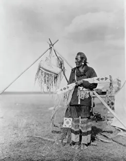 Tripod Prints: In a Blackfoot camp, c1927. Creator: Edward Sheriff Curtis