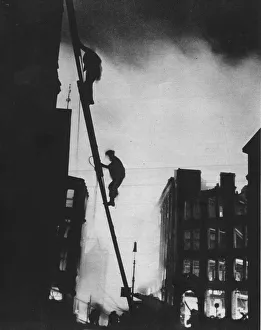 Ladder Prints: Out in the Blitz, silhouetted aganinst the light of fires