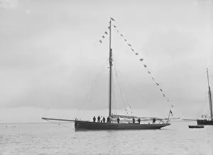 Bloodhound at anchor with flags, August 1912. Creator: Kirk & Sons of Cowes