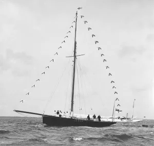 Marquis Of Gallery: Bloodhound at anchor with prize flags, 1909. Creator: Kirk & Sons of Cowes