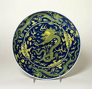 Qianlong Period Gallery: Blue-Ground Yellow-Enameled Dragon Dish, Qing dynasty, Qianlong reign (1736-1795)