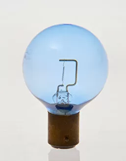 Automibilia Gallery: Blue headlamp bulb circa 1930. Creator: Unknown