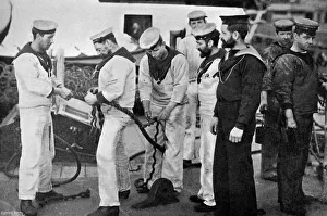 Blue jackets at work splicing a rope on board the battleship HMS Majestic, 1896. Artist: Gregory & Co