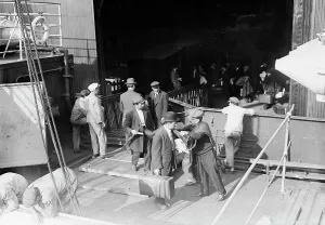 Suitcase Prints: Boarding the MADONNA, 1912. Creator: Bain News Service