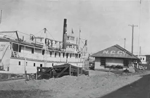 Boat docked at N.C. Co. between c1900 and 1916. Creator: Unknown