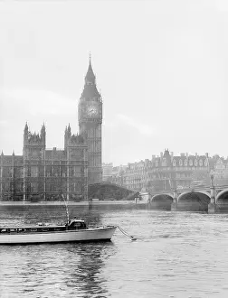 Victorian Gothic Prints: Boat passing along the Thames in front of Big Ben and the Houses of Parliament