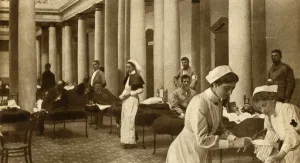 Hospital Prints: Boer and Briton Nursed Together, 1900, (1933). Creator: Horace Walter Nicholls