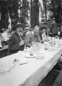 Luncheon Prints: Bohemian Club Grove scene, between 1896 and 1911. Creator: Arnold Genthe