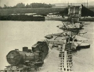 Bombed bridge and derailed train, northern France, First World War, 1914, (c1920) Bombed bridge and derailed train, northern France, First World War, 1914, (c1920)