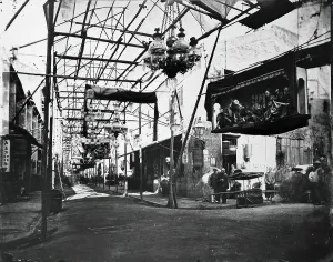 Streetlighting Prints: Bonham Strand, Hong Kong, 1981 (from a negative of 1869). Creator: John Thomson