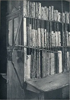 Bookshelves Gallery: Bookcase, 15th century, with some later editions, and catalogue frame, 17th century, c1931