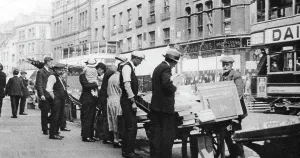 Browsing Prints: Bookstalls on Shoreditch High Street, London, 1926-1927. Artist: Whiffin