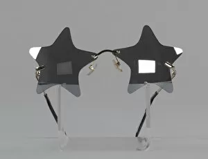 Nineties Collection: Bootsy Collins style star-shaped mirrored lens sunglasses, 1993-2013. Creator: elope, inc