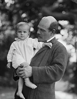Borglum, Gutzon, Mr. and child, outdoors, 1917 Aug. 18. Creator: Arnold Genthe