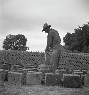 Resettlement Prints: Bosque Farms project - making adobe brick for school and permanent houses