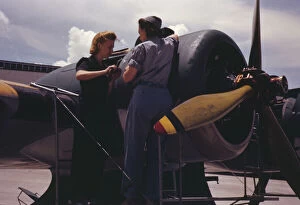 Aeronautics Gallery: Bowen, a riveter, and Olsen, her supervisor, in the Assembly...Air Base, Corpus Christi, Texas
